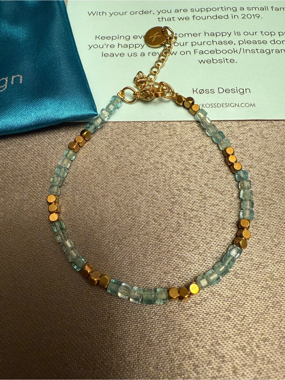 Koss Design Gold & Light Blue Beaded Bracelet